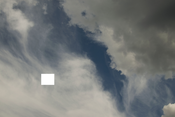 A sky with some clouds. On the left, there's a white square.